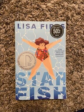 Lisa Fipps "Starfish" Paperback - Blue Pool Cover with Floral Swimsuit